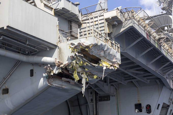 Photos Reveal Damage to U.S. Supercarrier After Collision with Cargo Ship