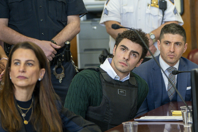 Murder Suspect in CEO Killing Grabs Attention with Courtroom Attire
